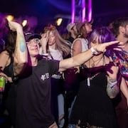 Crowd of People Dancing at King Cabbage Brass Band concert at Tulsa House SXSW 2023