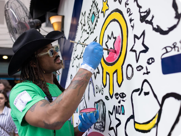 Man painting on a wall